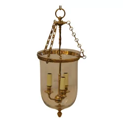Lanterne cloche à 3 lumières en bronze doré.