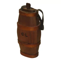 Small oval wooden liquor barrel with an inscription CL …
