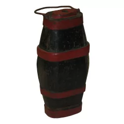 Small liquor barrel in red and black painted wood with a …