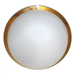 brass ceiling light with frosted glass.