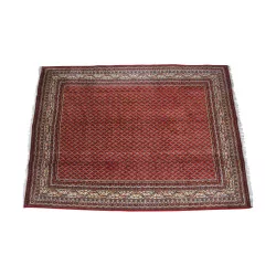 Mechanical rug in red wool Mir design.