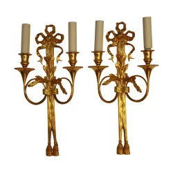 Pair of “Trumpet” wall lights in gilded bronze with 2 lights.