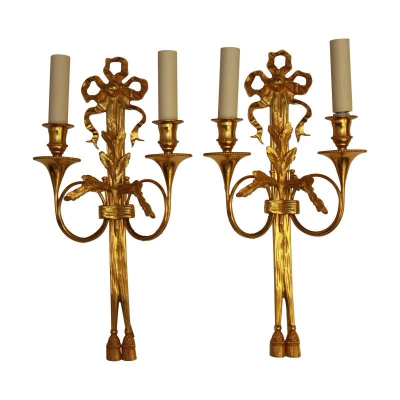 Paar Wandleuchten „Trompete“ aus vergoldeter Bronze mit 2 Leuchten. - Moinat - Wandleuchter