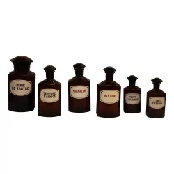 Series of 6 burnished glass pharmacy bottles with stopper, …