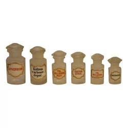 Series of 6 glass pharmacy bottles with caps and …