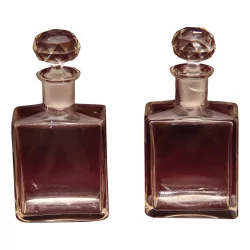 Pair of glass pharmacy bottles with screw caps