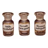 Series of 3 glass pharmacy bottles with inscription on … - Moinat - Carafes