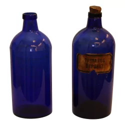 Pair of pharmacy blue glass bottles. Period: 19th …
