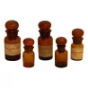 Series of 5 burnished glass pharmacy bottles with … - Moinat - Carafes