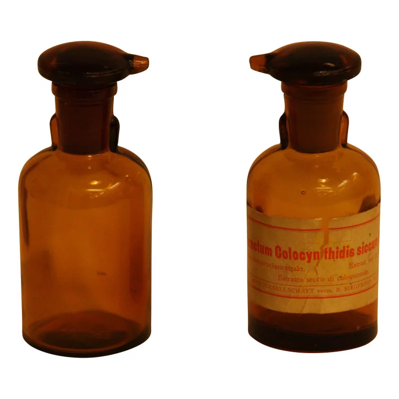 Pair of burnished glass pharmacy bottles with caps … - Moinat - Pharmacie