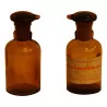 Paar Apothekerflaschen aus brüniertem Glas mit Verschlüssen … - Moinat - Pharmacie