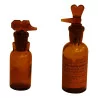 Pair of burnished glass pharmacy bottles with caps … - Moinat - Pharmacie