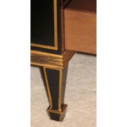 Cascading bookcase in black painted wood and golden threads.