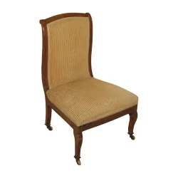 Louis-Philippe low chair in walnut. Period: 20th century.