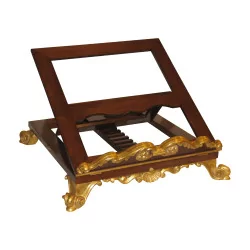 Book holder in mahogany and gilded wood, richly