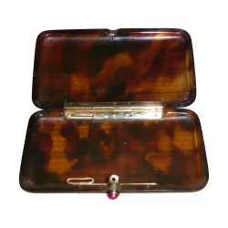 Small tortoiseshell box with gold threads and ruby button, in