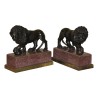Paire de lions en bronze avec socle en porphyre, roche - Moinat - Bronzes