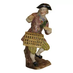 Figurine de Saxe (Meissen) “L'homme à la cage à …