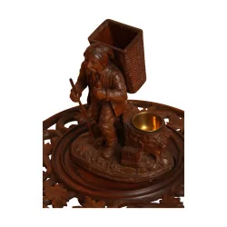 Guéridon “Table de fumeur” de Brienz en bois sculpté. fin …