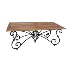 Dining table with black wrought iron base and …