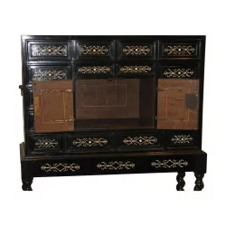 Louis XIII style cabinet with black and gilt marquetry.