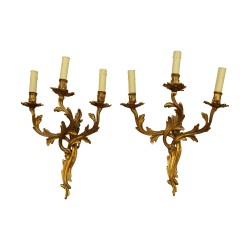 Paire d'appliques Louis XV à 3 bras en bronze doré, à …
