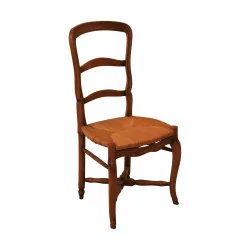 把带稻草座椅的胡桃木椅子。时期：20世纪