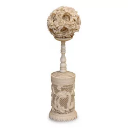 Canton ball in ivory carved with dragons among the clouds...