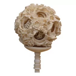 Canton ball in ivory carved with dragons among the clouds...