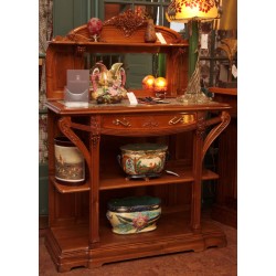 Art-Nouveau dining room in walnut carved with bunches of grapes,