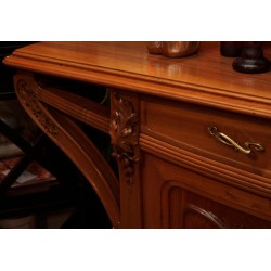 Art-Nouveau dining room in walnut carved with bunches of grapes,