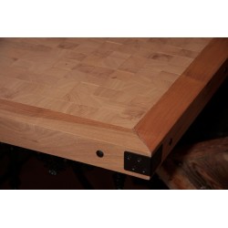 Butcher’s table with wooden top standing with the center in …
