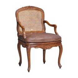 Louis XV Regency walnut lounge armchair, flat back, caned