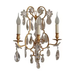 Wall light with 3 lights, in nitrated gilded bronze and crystals.