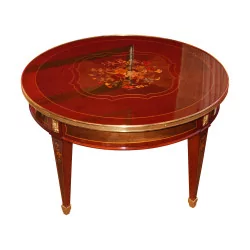 круглый столик из красного дерева с инкрустацией в виде пятен и