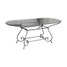 Table ovale modèle Vufflens en fer forgé avec plateau en tôle … - Moinat - Heritage