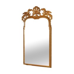 Miroir doré avec coquillage.