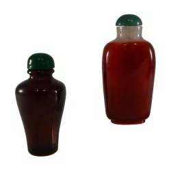 Pair of Beijing glass snuff bottles, one with a cork in