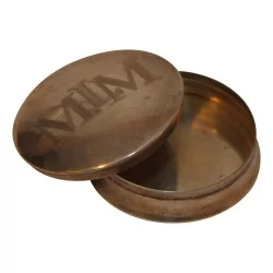 Petite boite ronde (à pillules) avec inscription sur le