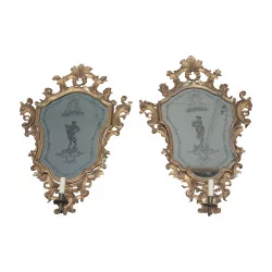 Pair of Venetian mirrors with candlesticks in the center in …
