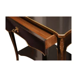 件路易十五风格的 Dorival 黑木桌，木质台面……