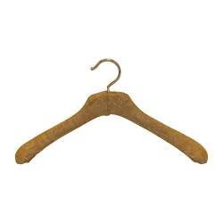 wooden hanger lined with chamois-colored Kathmandu fabric.