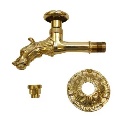 Dragon fountain faucet in polished brass.