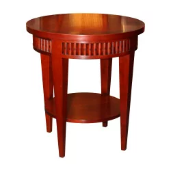 Round pedestal table in cherry wood, with tray between legs.