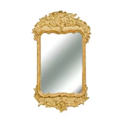 Louis XV mirror in wood gilded with fine gold, richly carved with …