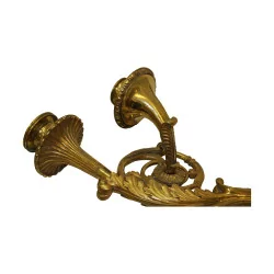 Paar Empire-Wandleuchter aus gemeißelter vergoldeter Bronze „zwischen - …