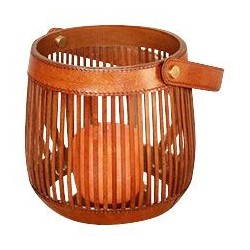 round glass tealight holder with tan leather strap.