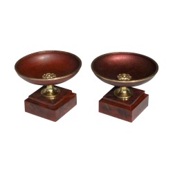 Pair of cups in enamelled sheet metal in red gold painted on …