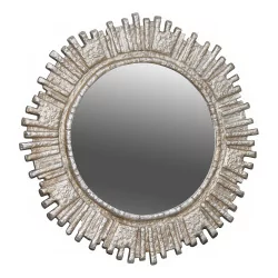 \"Vosges\" round mirror in silver metal.