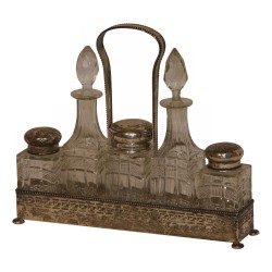 Liberty Cruet с 5 бутылками, крепление из серебра 800. Конец 19 …